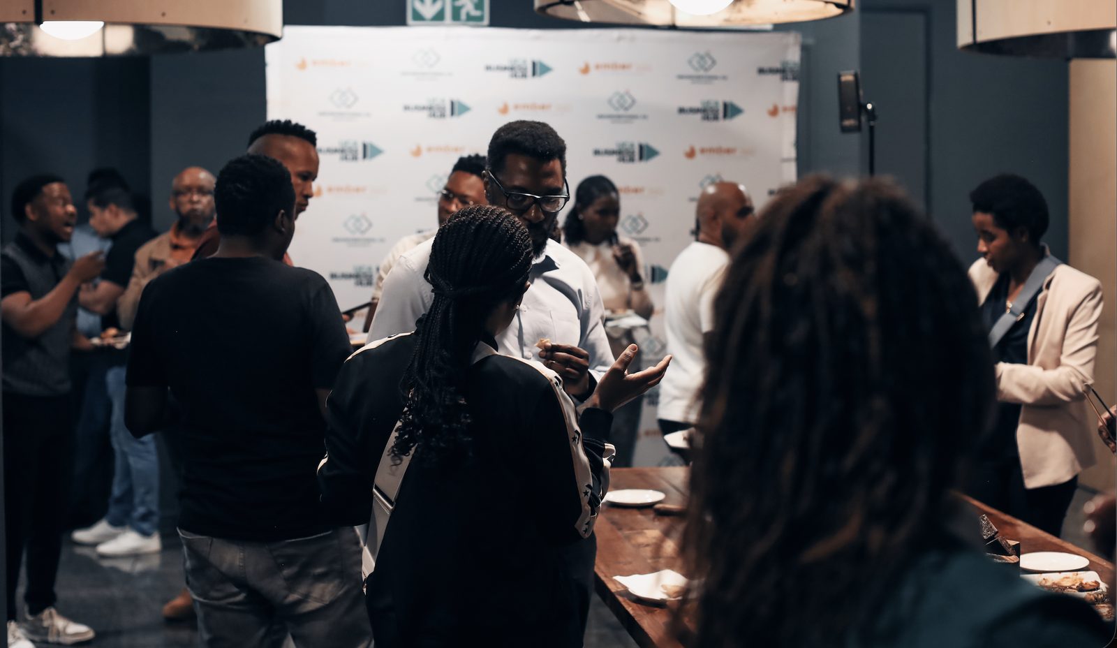 Attendees networking during the break